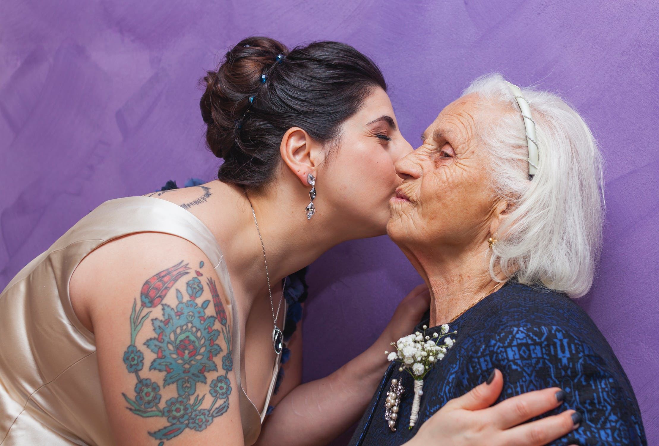 Woman Kissing Grandmother